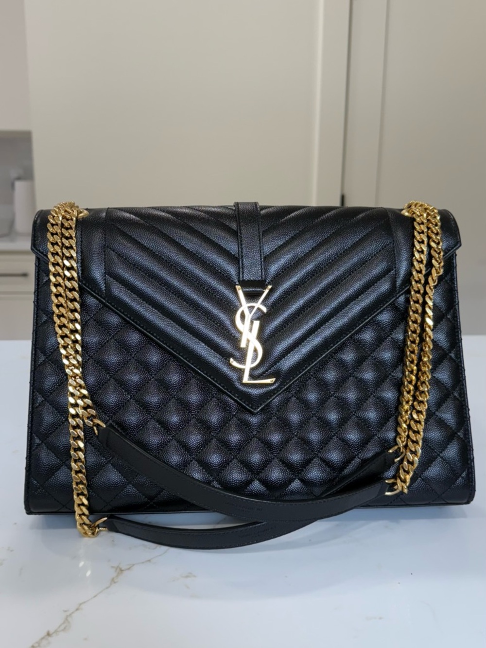Yves Saint Laurent ENVELOPE IN QUILTED GRAIN DE POUDRE EMBOSSED LEATHER (LARGE)